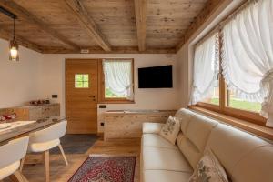 TV a/nebo společenská místnost v ubytování Incantevole appar chalet nuovo