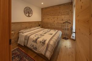 Postel nebo postele na pokoji v ubytování Incantevole appar chalet nuovo
