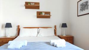 Una cama o camas en una habitación de Civico 19