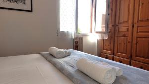 Una cama o camas en una habitación de Civico 19