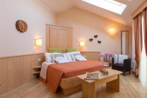 Postel nebo postele na pokoji v ubytování Garden Relais + 37 fotografií