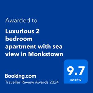 Luxurious 2 bedroom apartment with sea view in Monkstown في بلاكروك: لقطه شاشة هاتف مع النص تم ترقيه لشقه غرفه نوم فاخره مع البحر