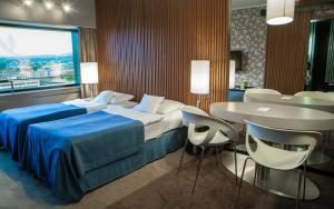 Postel nebo postele na pokoji v ubytování Hotel Yasmin Košice