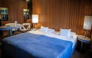 Postel nebo postele na pokoji v ubytování Hotel Yasmin Košice
