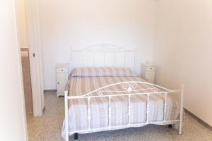 Postel nebo postele na pokoji v ubytování Lamapecora