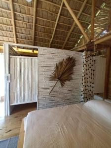 Postel nebo postele na pokoji v ubytování Samo Eco Lodge