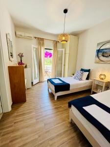A bed or beds in a room at Katerina