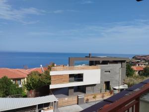 a modern house with a view of the ocean at Sozopol Paradise view in Sozopol