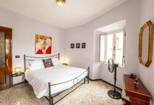 Posteľ alebo postele v izbe v ubytovaní Casa Robina