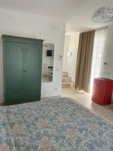 Postel nebo postele na pokoji v ubytování LA CASA DI PIETRA