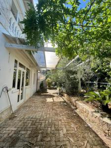 Κήπος έξω από το La Villa del Conte di Pirro