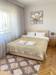 A bed or beds in a room at Light house