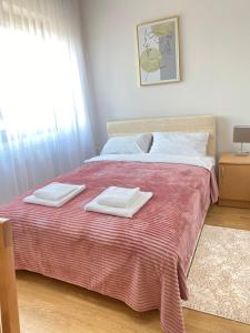 A bed or beds in a room at Light house