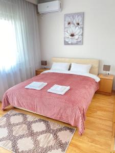 A bed or beds in a room at Light house