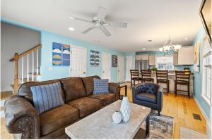 a living room with a couch and a table at Private Home In Duplex with Pool in Fairfield