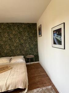 Posteľ alebo postele v izbe v ubytovaní Le chêne fleuri