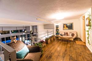 a living room with a bed and a couch at Island Villa Sani Sea View in Sani Beach +14 photos