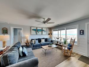 Posezení v ubytování Sea Paradise Cottage