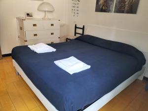 A bed or beds in a room at Verde Mare Aptm - Rooftop Terrace - near sea- A.C.