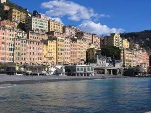a group of buildings on the shore of a body of water at La Camogliese Hotel B&B in Camogli