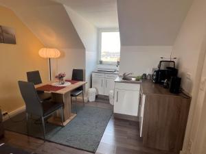 Kuchyň nebo kuchyňský kout v ubytování Studio Apartment Frühauf Geithain