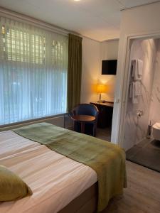 Katil atau katil-katil dalam bilik di Hotel Lemmer