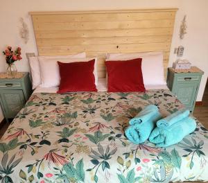 Postel nebo postele na pokoji v ubytování Casa Pepe con parcheggio