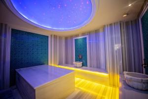 a room with a bath tub and a room with a ceiling at Grand Marcello Hotel & SPA in Istanbul +137 photos