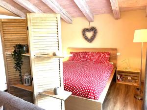 Posteľ alebo postele v izbe v ubytovaní Il loft di Angela - You & Me case vacanza
