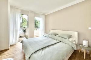 Postel nebo postele na pokoji v ubytování Modernes Studio beim Domplatz