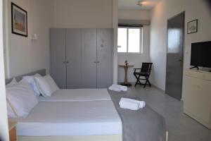 Posteľ alebo postele v izbe v ubytovaní Lefteris Apartments in Ialysos Rhodes