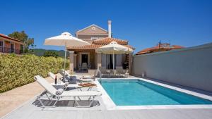 The swimming pool at or close to Cosmos Villas Spyridoula