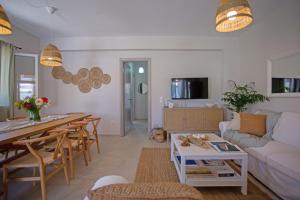 A television and/or entertainment centre at Cosmos Villas Spyridoula