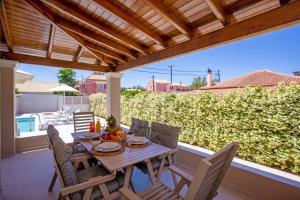 A balcony or terrace at Cosmos Villas Spyridoula