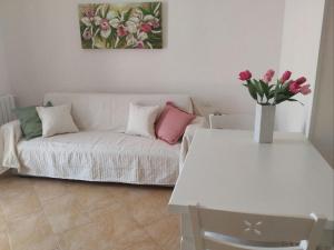 A bed or beds in a room at Birgi holiday home