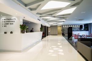 O saguão ou recepção de Hotel WZ Jardins