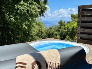 a swimming pool on the roof of a house at Vallegrande Nature Resort by Geocharme in Cefalù