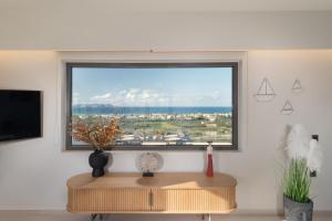 TV a/nebo společenská místnost v ubytování Terra Della Salvia in Crete