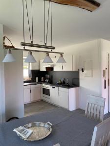 Η κουζίνα ή μικρή κουζίνα στο Ferienwohnung Harztraum