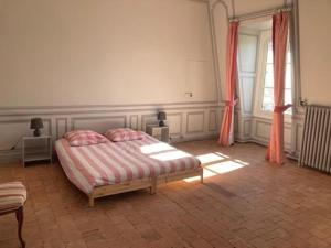 Posteľ alebo postele v izbe v ubytovaní Hôtel du marquis De Broc