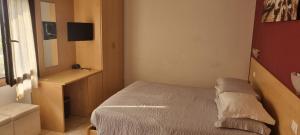 Postel nebo postele na pokoji v ubytování Laguna B&B