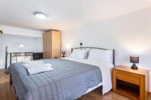 A bed or beds in a room at Neva's Apartment's in Center Chania 1 2