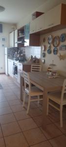 Kuchyň nebo kuchyňský kout v ubytování Laguna B&B