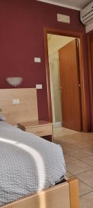 Postel nebo postele na pokoji v ubytování Laguna B&B