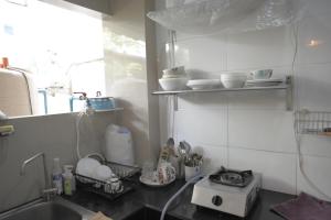 ครัวหรือมุมครัวของ KENCOZY accommodation