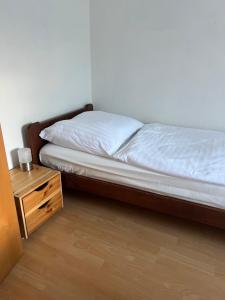 Postel nebo postele na pokoji v ubytování Eisenerz Alpine Apartement RoSy