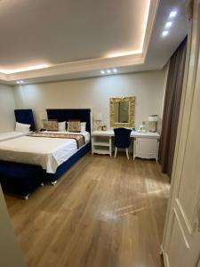 Postel nebo postele na pokoji v ubytování Hotel Brais
