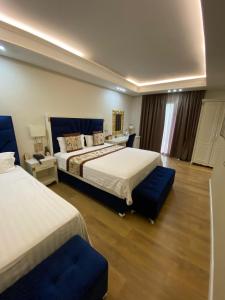 Postel nebo postele na pokoji v ubytování Hotel Brais