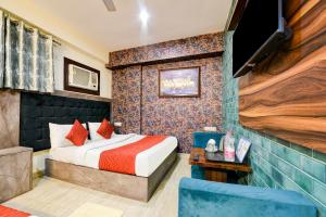 Ένα ή περισσότερα κρεβάτια σε δωμάτιο στο Hotel Venture Near New Delhi International Airport
