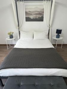 En eller flere senge i et værelse på Rodopi Mountain Village House + 27 billeder